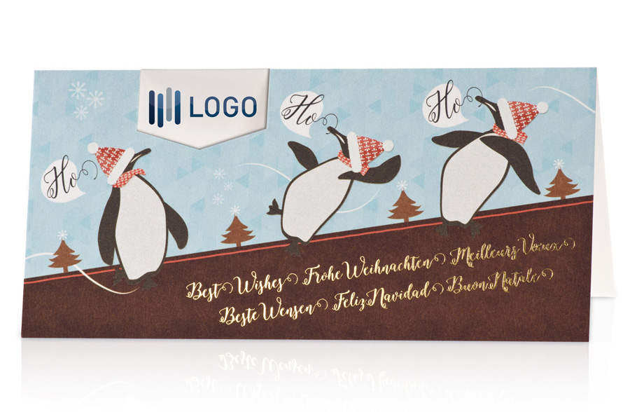 Weihnachtskarte mit drei lustigen Pinguinen mit Platz für Firmen-Logo