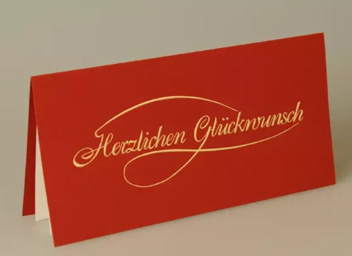 Rote Glückwunschkarte DIN lang mit Goldfolienprägung "Herzlichen Glückwunsch"