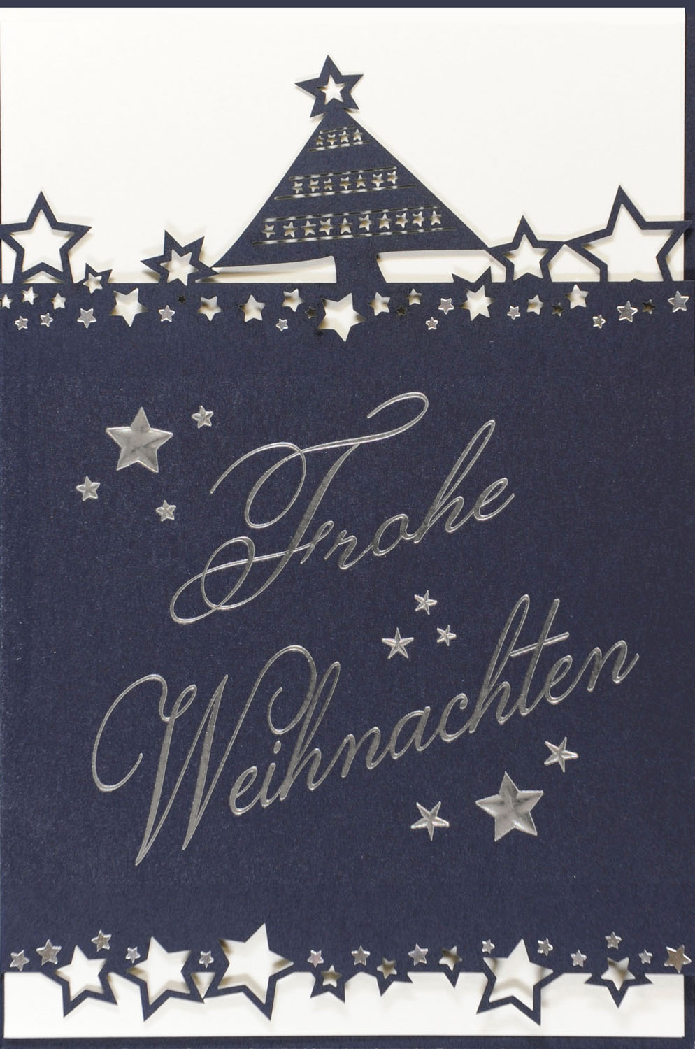 Weihnachtskarte nachtblau mit lasergestanzter Kontur und Frohe Weihnachten in Silber