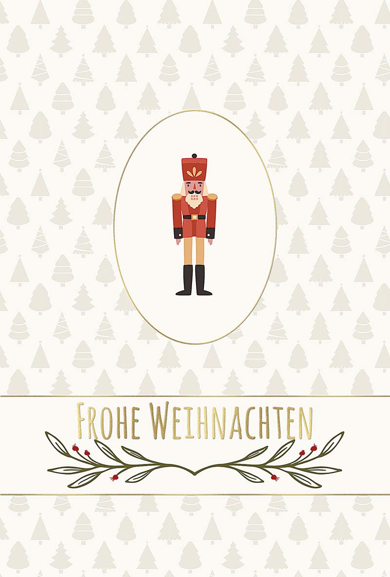 Traditionelle Weihnachtskarte mit kleinen Tannnenbäumchen, Gruß und Nussknacker