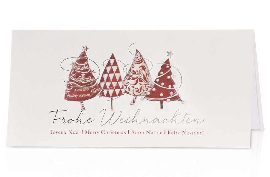 Weihnachtskarte weiß mit vier Weihnachtsbäumen in div. Designs
