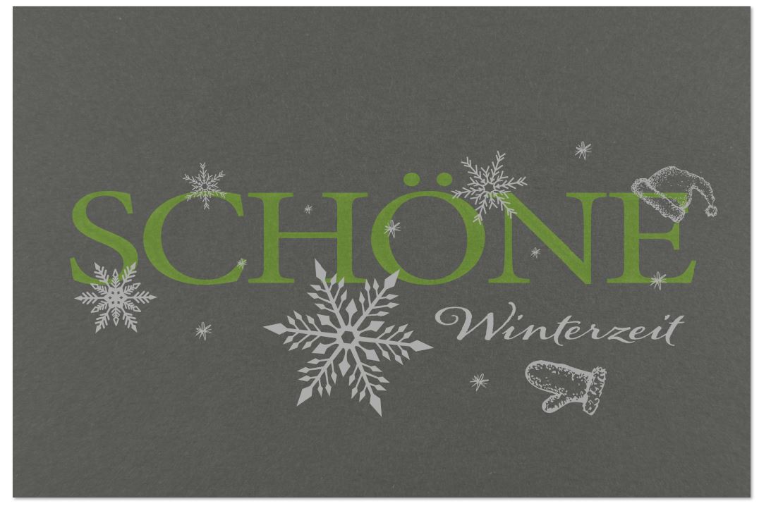 Dunkelgraue Weihnachtskarte im winterlichen Design mit Eiskristallen und Foliendruck in grün und silber