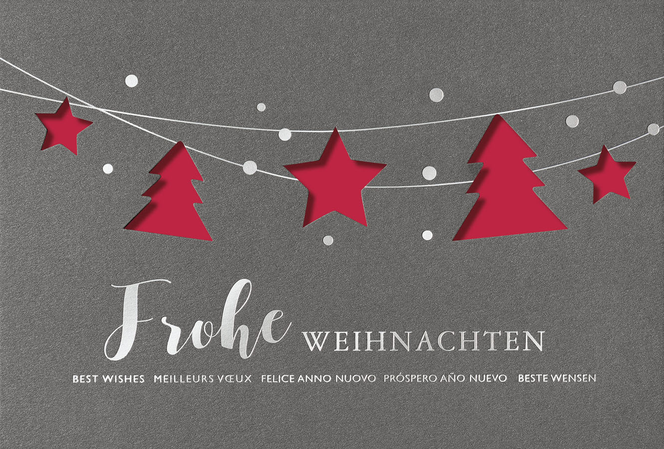 Weihnachtskarte anthrazit international mit gestanzten Weihnachtsbäumen und Sternen Einleger rot