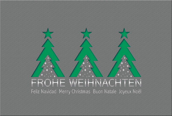 Anthrazitfarbene Weihnachtskarte mit mehrsprachigen Weihnachtsgrüßen und grünem Einleger