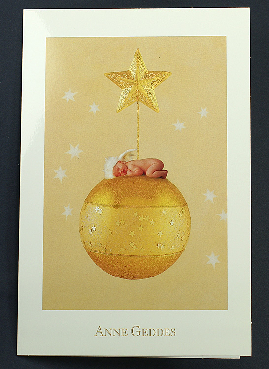 Weihnachtskarte Anne Geddes mit Baby auf Weihnachtskugel