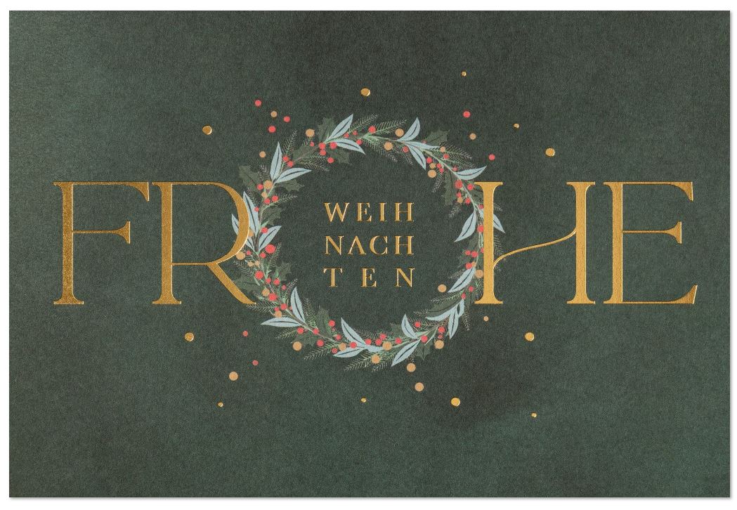 Weihnachtskarte in dunkelgrün mit floralem Kranz und goldgeprägtem Gruß "Frohe Weihnachten"