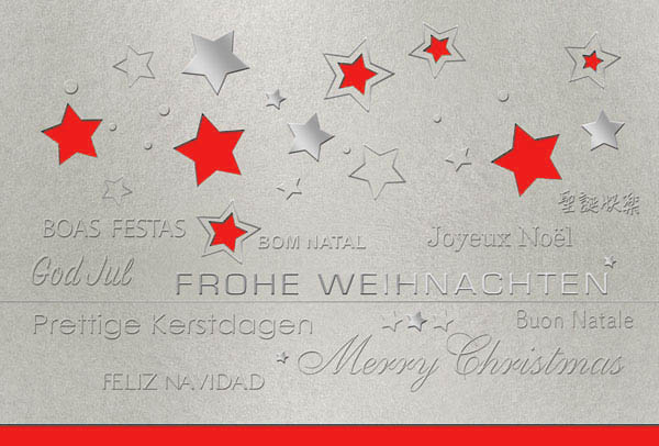 Silberne Weihnachtskarte mit internationalen Grüßen, gestanzten Sternen und Einleger in rot