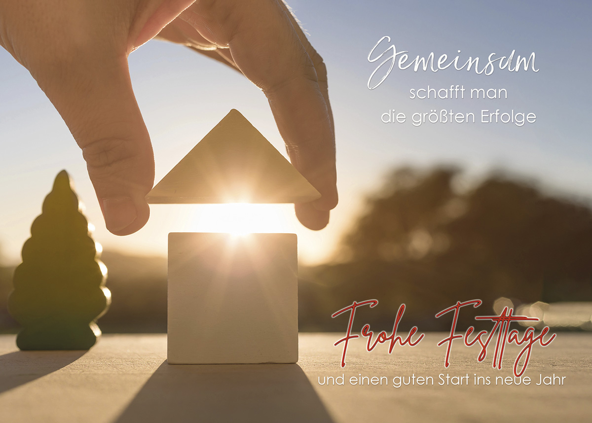 Ausgefallene Firmen-Weihnachtskarte mit Haus aus Bauklötzen passendem Slogan und Weihnachtsgruß 