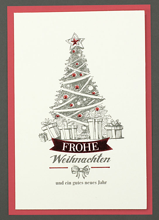 Weihnachtskarte in creme mit einem Weihnachtsbaum und Geschenken sowie roter Folienprägung