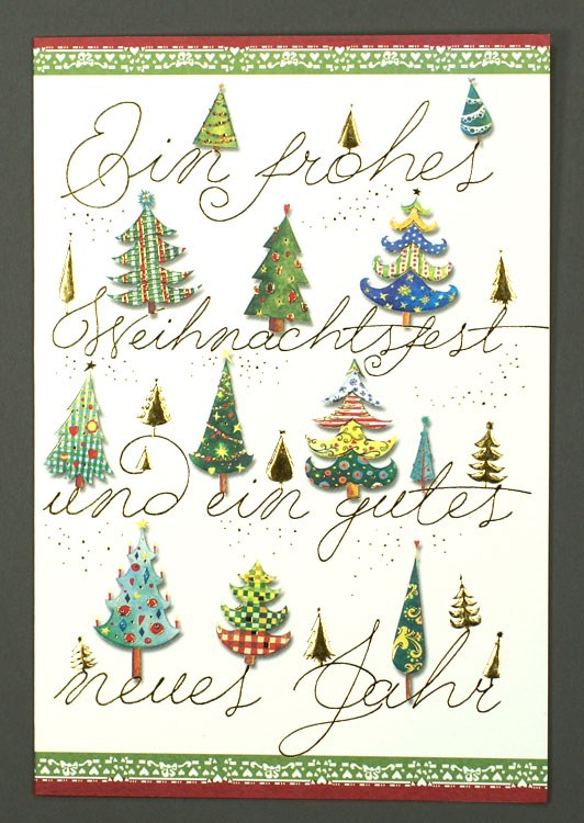 Weihnachtskarte mit goldener Schrift und Weihnachtsbäumen