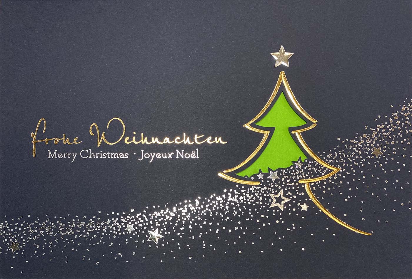 Blaue Weihnachtskarte mit internationalen Weihnachtsgrüßen und grünem Einlegeblatt