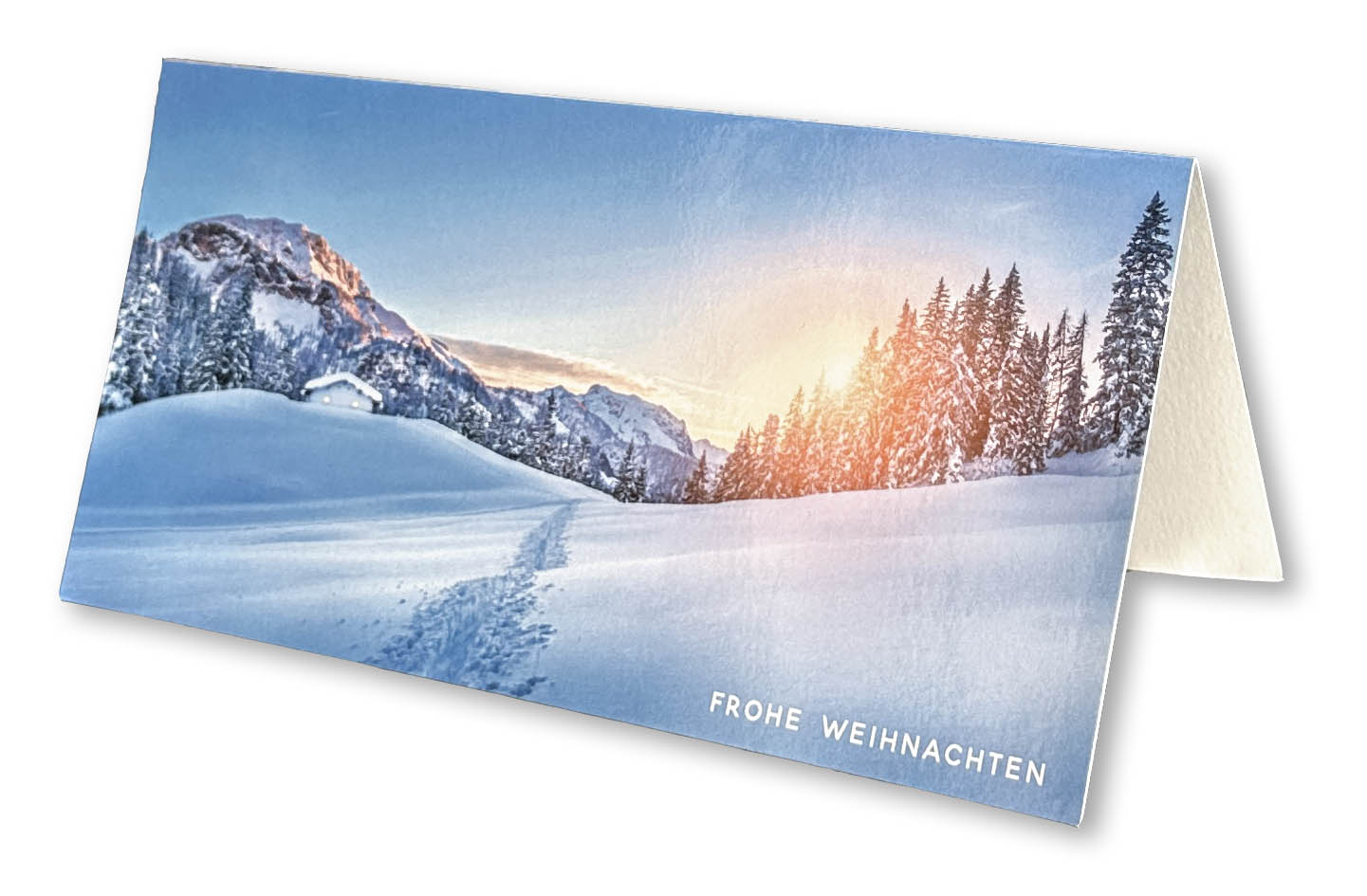 Weihnachtskarte "Sonnenaufgang im Winter" mit verschneiter Berglandschaft am frühen Morgen.