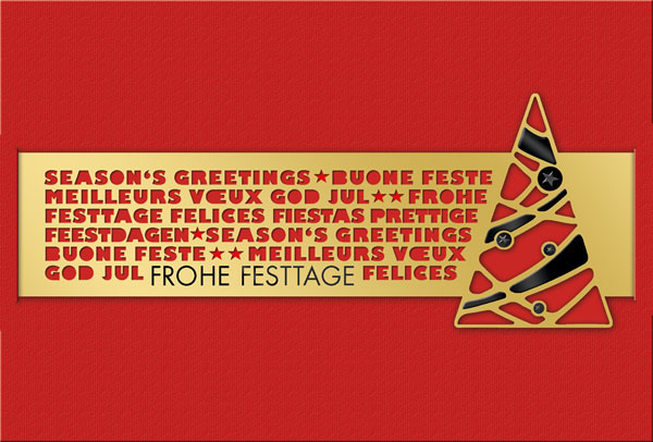 Weihnachtskarte rot mit lasergestanzter Schrift auf goldfarbener Banderole