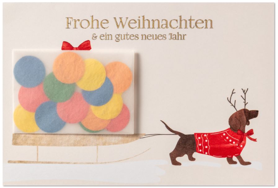 Kreative Weihnachtskarte „Dackel mit Schlitten“ mit tranpsarentem Kuvert und buntem Samenpapier-Konfetti