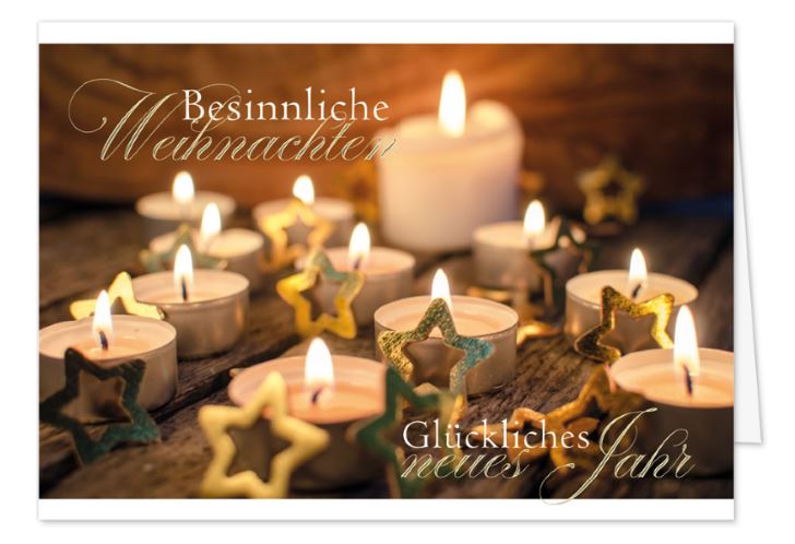 Stimmungsvolle Spendenweihnachtskarte „Lichterglanz“ mit Teelichtern und Gutem Zweck: Kinderkrebs-Stiftung