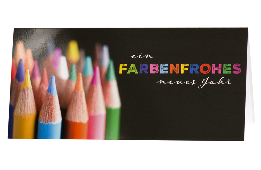 Neujahrskarte mit Buntstiften für ein farbenfrohes neues Jahr