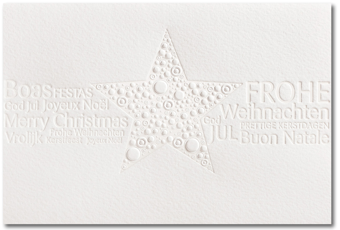 Weihnachtskarte weiß mit Stern und internationalen Weihnachtswünschen