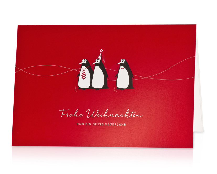 Weihnachtskarte rot mit drei Pinguinen Frohe Weihnachten