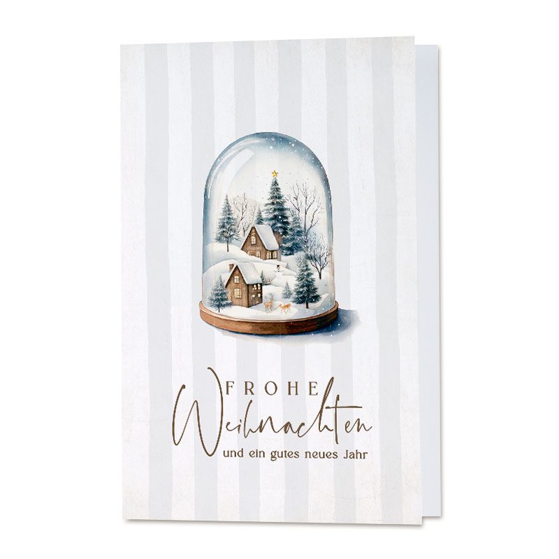 Stimmungsvolle Winter-Weihnachtskarte mit idyllischem Dorf in einer Schneekugel und Weihnachtsgruß