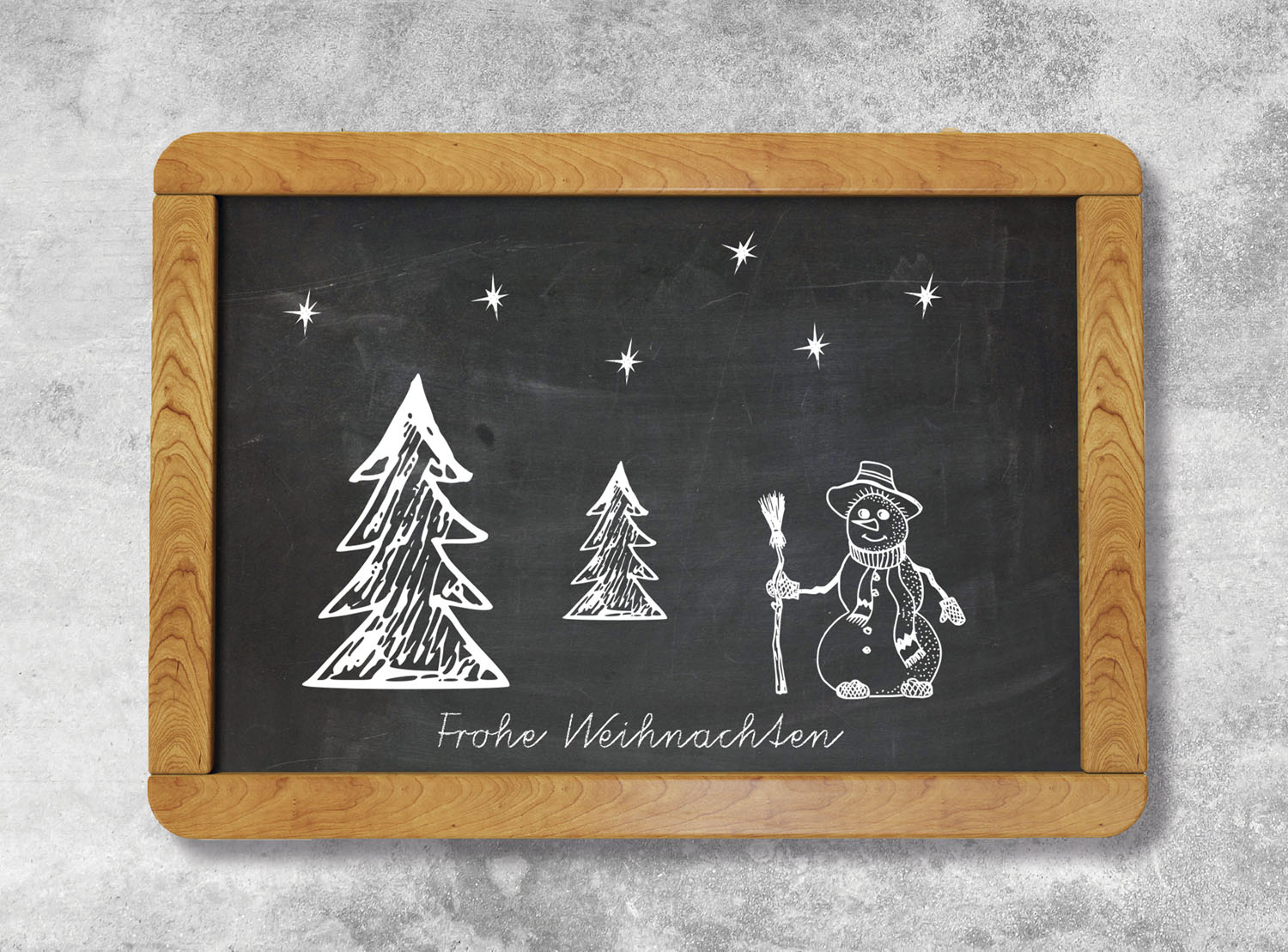 Weihnachtskarte mit Schiefertafel und Weihnachtssymbolen Frohe Weihnachten