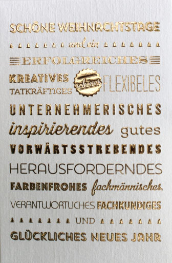 Weihnachtskarte mit Leinenstruktur und goldenem Grußtext reliefgeprägt
