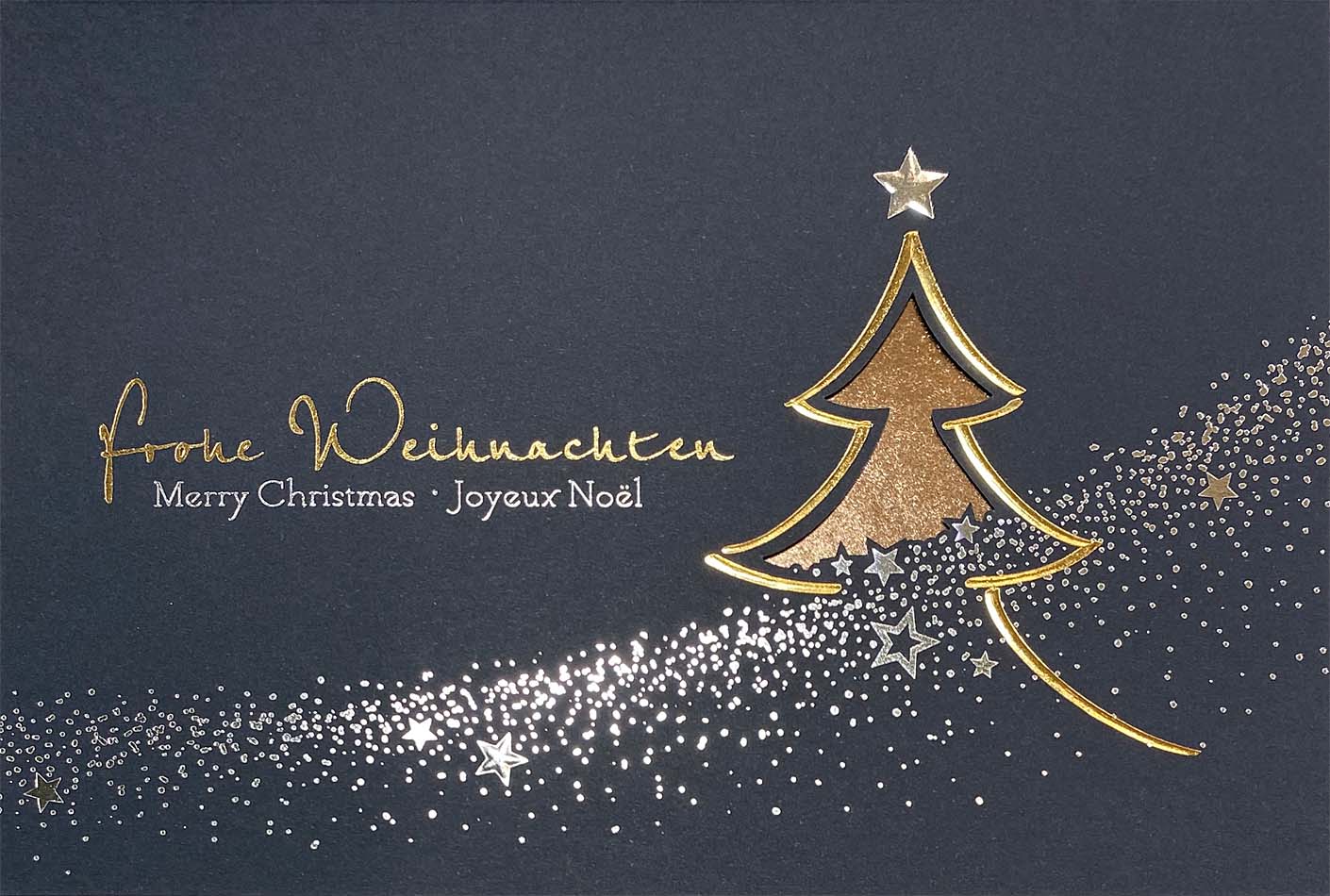 Blaue Weihnachtskarte mit internationalen Weihnachtsgrüßen und kupferfarbenem Einlegeblatt