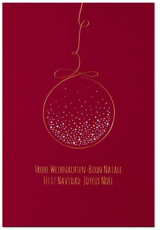 Internationale Weihnachtskarte in Dunkelrot mit hängender Weihnachtskugel und Gruß "Frohe Weihnachten" in mehreren Sprachen