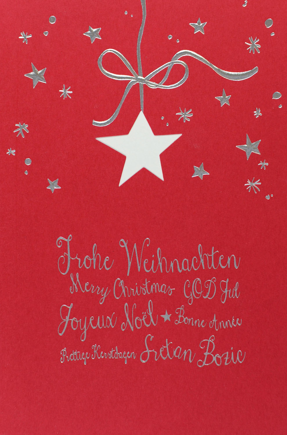 Weihnachtskarte rot mit Sternen und internationalen Weihnachts-Wünschen
