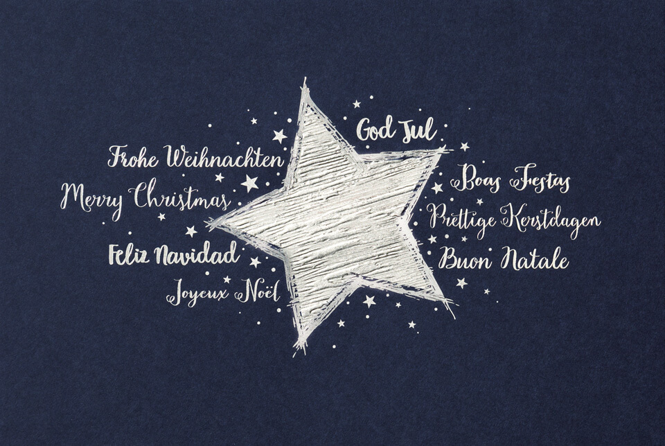 Weihnachtskarte nachtblau mit internationalen Weihnachtsgrüßen und silbernem Stern